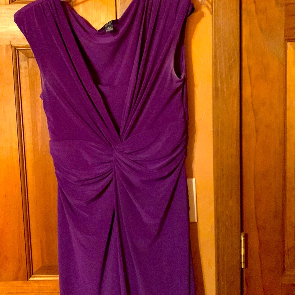 Champs dress size large, no sleeves just above the knee.